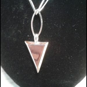 Silver colored chain with clear stone